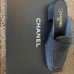 Black Chanel mules